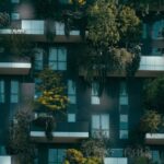 Urban Greenery - Modern residential building facade decorated with green plants