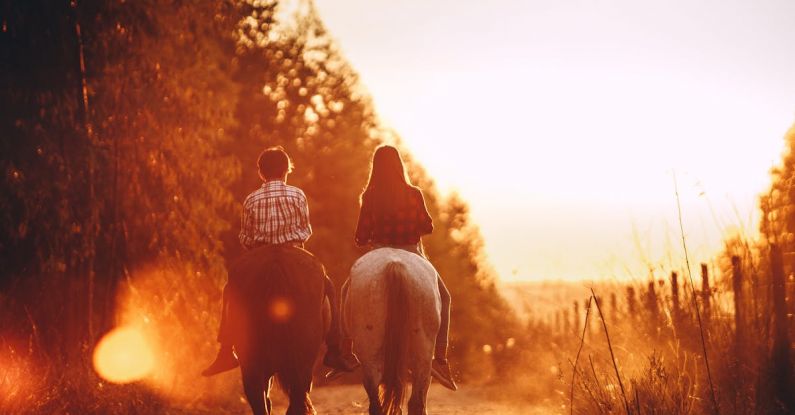 Car-Free Zones - Children riding stallions in countryside at bright sundown