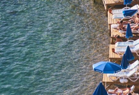 Amenities - People Relaxing On The Beach