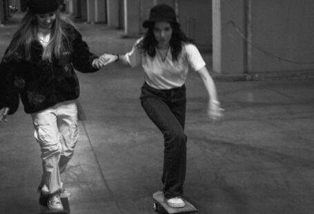 Parks And Recreational Areas - Grayscale Photo of Women Riding Skateboard