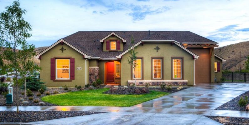 Residential Real Estate - Lighted Beige House