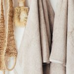 Sustainable Properties - Set of body care tools with towels on hanger
