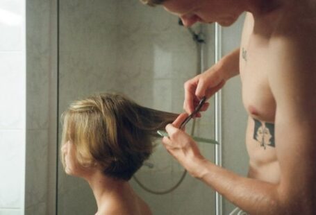 Tenant Relations - Man Cutting Hair his Little Brother