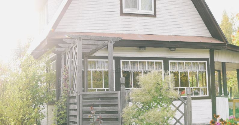 Seasonal Property Rentals - Exterior of cozy rural wooden cottage