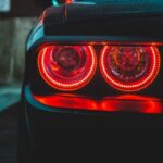 Public Parks - Red headlight on black car