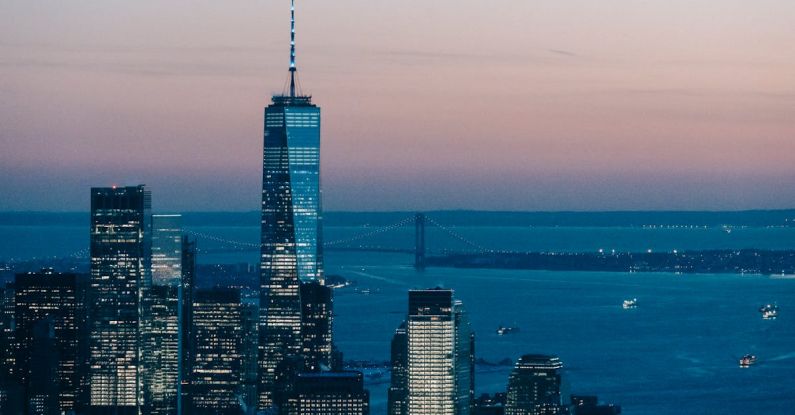 Waterfront Development - Skyscrapers near sea in evening time