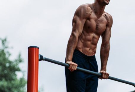 Outdoor Gyms - Man Exercising on a Outdoor Gym