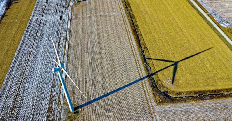 Environmental Design - High Angle Photo of Wind Turbine on Field