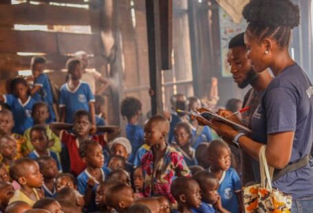 After-School Programs - People Sitting on the Floor