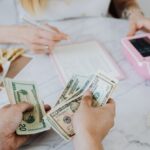 Financing Methods - Counting Dollar Bills