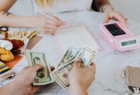 Financing Methods - Counting Dollar Bills